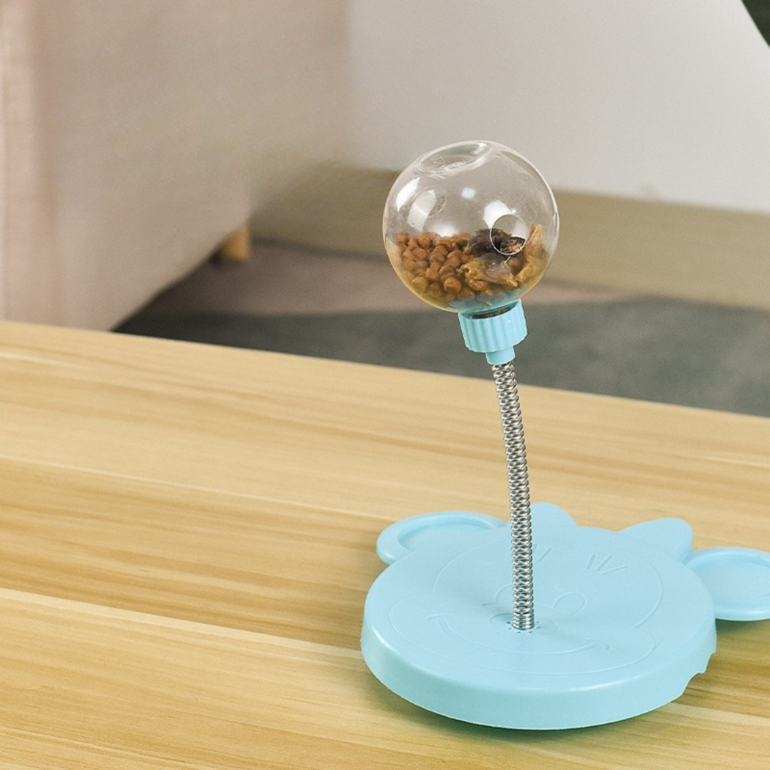 Jouet distributeur de friandises oscillant pour chiens