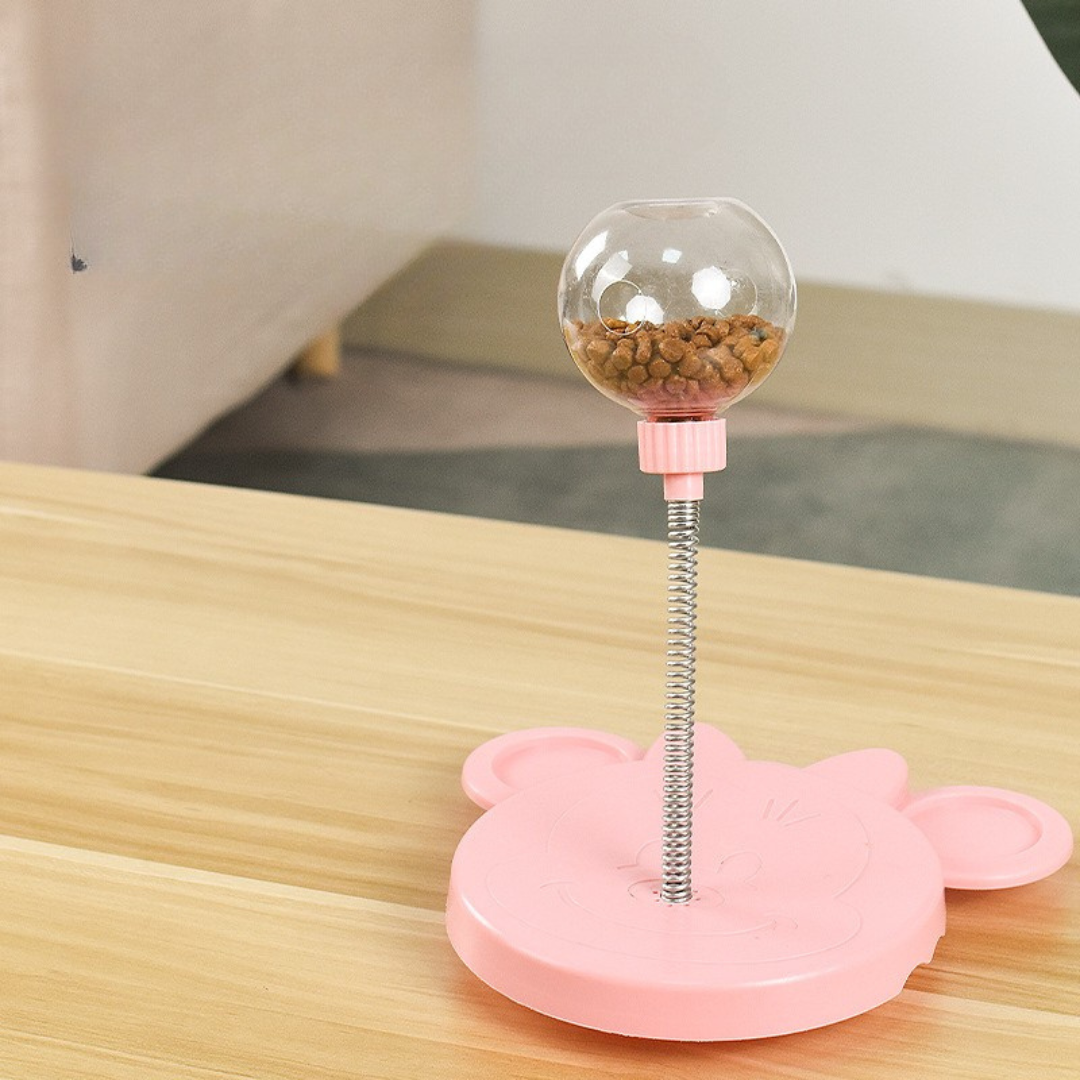 Jouet distributeur de friandises oscillant pour chiens