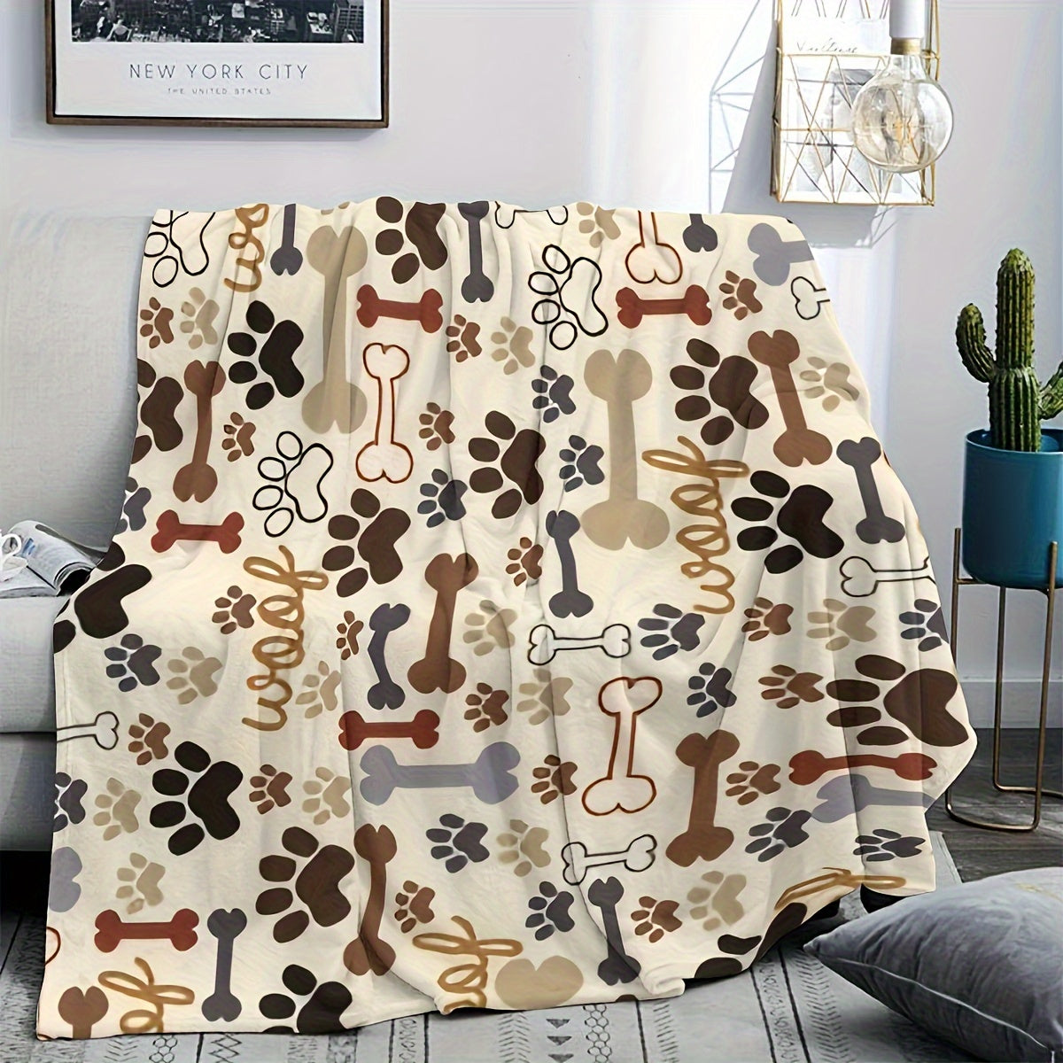 Couverture Flanelle Motif Pattes & Os – Chaude, Douce et Multi-Usages
