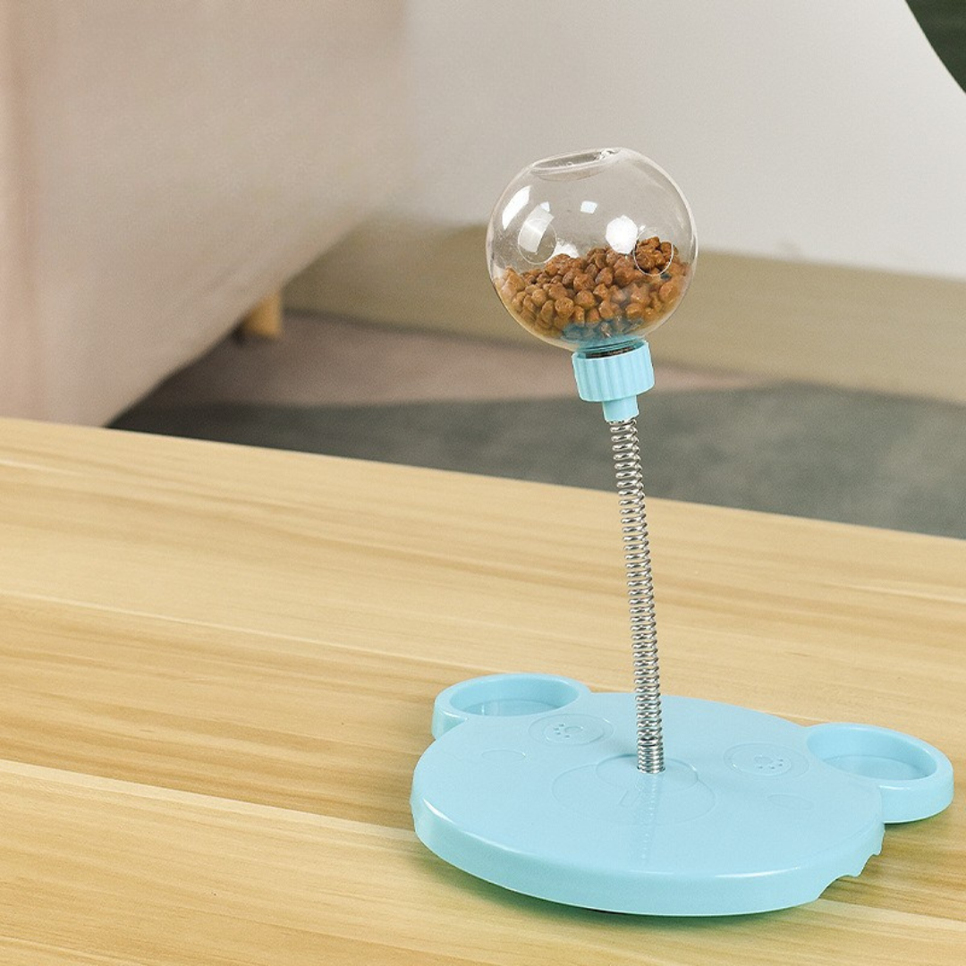 Jouet distributeur de friandises oscillant pour chiens